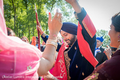 Sikh groom dancing. indian wedding planner,indian wedding baraat,indian pre-wedding celebrations