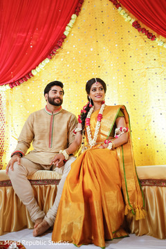 Indian bride and groom at their sangeet. Indian bride and groom at their sangeet.