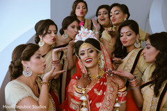 Indian bridesmaids giving some love the bride. Indian bridesmaids giving some love the bride.