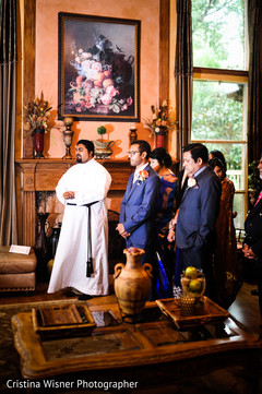 Indian groom's praying with his family. Indian groom's praying with his family.