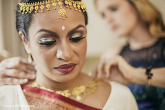 Lovely indian bride almost ready for wedding ceremony Lovely indian bride almost ready for wedding ceremony