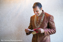Indian groom reads his bride letter. Indian groom reads his bride letter.