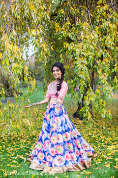 Beautiful bride in a modern pink lengha. Beautiful bride in a modern pink lengha.