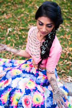 Lovely indian bride showing her mehndi design. Lovely indian bride showing her mehndi design.