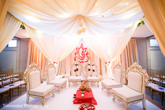 White mandap at indian wedding ceremony White mandap at indian wedding ceremony