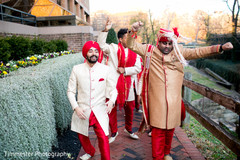 Indian groom and groomsmen walking to wedding ceremony Indian groom and groomsmen walking to wedding ceremony