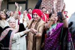 Indian wedding guests dancing before wedding ceremony Indian wedding guests dancing before wedding ceremony