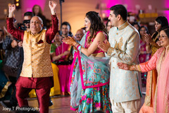 Indian lovebirds having fun at their sangeet night. Indian lovebirds having fun at their sangeet night.