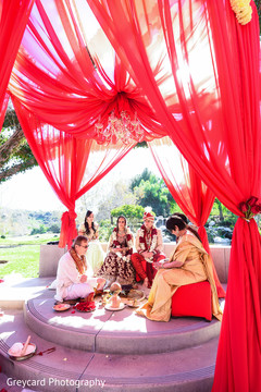 Stunning red draped indian mandap. indian wedding photography,indian bride,indian groom,indian wedding mandap