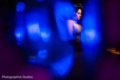 Bride captured while getting ready. indian bride,indian bride getting ready,indian bride makeup