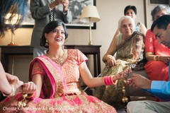 Indian bride during her bangle ceremony. indian bride,indian wedding jewelry,indian bridal fashions,indian bride getting ready