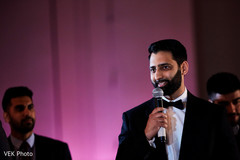 Indian groom saying some words at wedding reception Indian groom saying some words at wedding reception