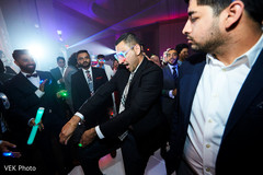 Indian groomsmen having fun at wedding reception Indian groomsmen having fun at wedding reception