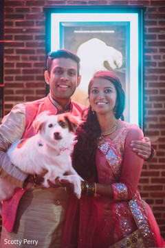 Indian bride and groom with their pet. Indian bride and groom with their pet.