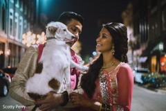 Cute indian couple with their dog. Cute indian couple with their dog.