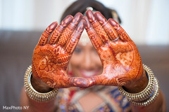 Lovely red bridal henna design. Lovely red bridal henna design.