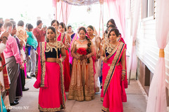 Indian bride escorted by her bridesmaids. indian bride,indian bridesmaids,indian wedding ceremony
