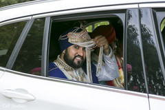 Groom in his transportation indian wedding baraat,indian wedding transportation,indian groom