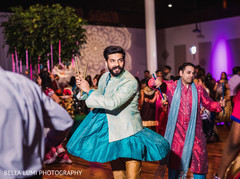 Groom dancing during garba Groom dancing during garba