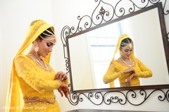 Indian bride in a unique yellow lehenga. Indian bride in a unique yellow lehenga.