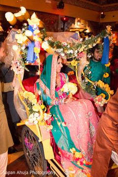 Pakistani bride inspiring grand entrance. indian weddings,indian sangeet,pakistani bride,rickshaw