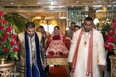 Beautiful bride carried in on a palanquin. Beautiful bride carried in on a palanquin.