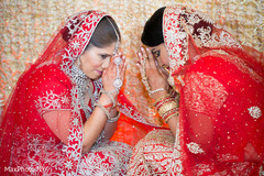 Indian gay brides praying. Indian gay brides praying.