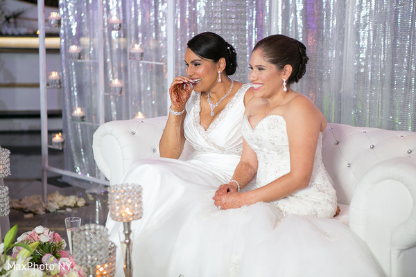 Indian lesbian lovebirds at their wedding reception.