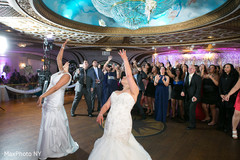Fantastic lesbian brides throwing the bouquet. Fantastic lesbian brides throwing the bouquet.