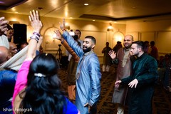 Groom having fun during pre wedding celebrations Groom having fun during pre wedding celebrations