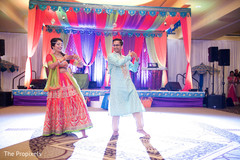Bride and groom performing a choreography indian bridal fashions,indian groom fashion,indian bridal lengha