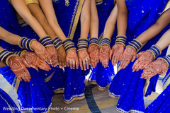 Indian bridesmaids showing their mehndi art photography indian wedding henna,indian bridesmaids’ fashion,pre-wedding ceremony photography