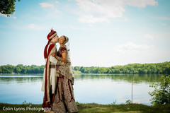 Post ceremony wedding photo shoot burgundy lengha,indian groom fashion,turban