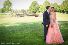 Sweet couple during their photo shoot indian wedding gowns,peach bridal gown