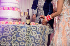 Indian couple eating cake at wedding reception indian wedding design,indian bridal jewelry,indian bride reception fashion