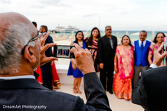 Indian couple parents taking photos before wedding ceremony Indian couple parents taking photos before wedding ceremony
