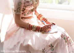 Indian bride writing her vows before wedding ceremony Indian bride writing her vows before wedding ceremony