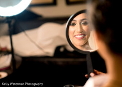 Indian bride getting ready for wedding reception Indian bride getting ready for wedding reception