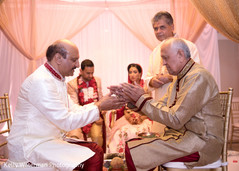 Indian couple fathers photography at wedding ceremony Indian couple fathers photography at wedding ceremony