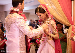 Indian couple at wedding ceremony indian bride makeup,indian wedding outfits,indian bridal jewelry