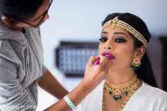 Bridal makeup session. indian bride getting ready,indian bridal hair and makeup,indian bridal jewelry