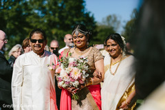 Indian bride walking into wedding ceremony Indian bride walking into wedding ceremony