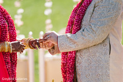 Indian couple exchanging rings at wedding ceremony Indian couple exchanging rings at wedding ceremony