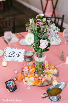 Table centerpieces at indian wedding reception Table centerpieces at indian wedding reception