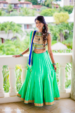 Indian bride in green sangeet outfit. Indian bride in green sangeet outfit.