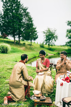 Adorable Indian bride and groom. indian wedding ceremony,outdoor wedding ceremony
