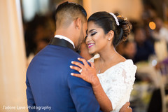 Newlyweds holding sweetly