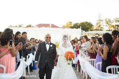 Maharani walking down the aisle indian wedding,outdoor wedding