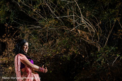 Indian bride dancing at sangeet ceremony Indian bride dancing at sangeet ceremony