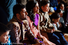 Indian couple having a good time at sangeet ceremony Indian couple having a good time at sangeet ceremony